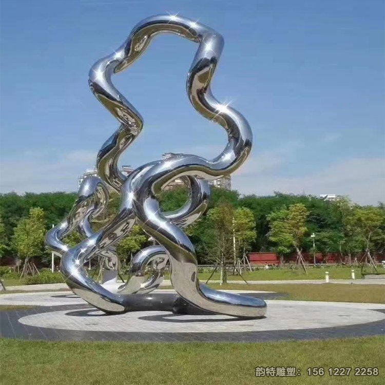 廣場不銹鋼鏡面飄帶雕塑，扭曲飄帶絲帶雕塑造型
